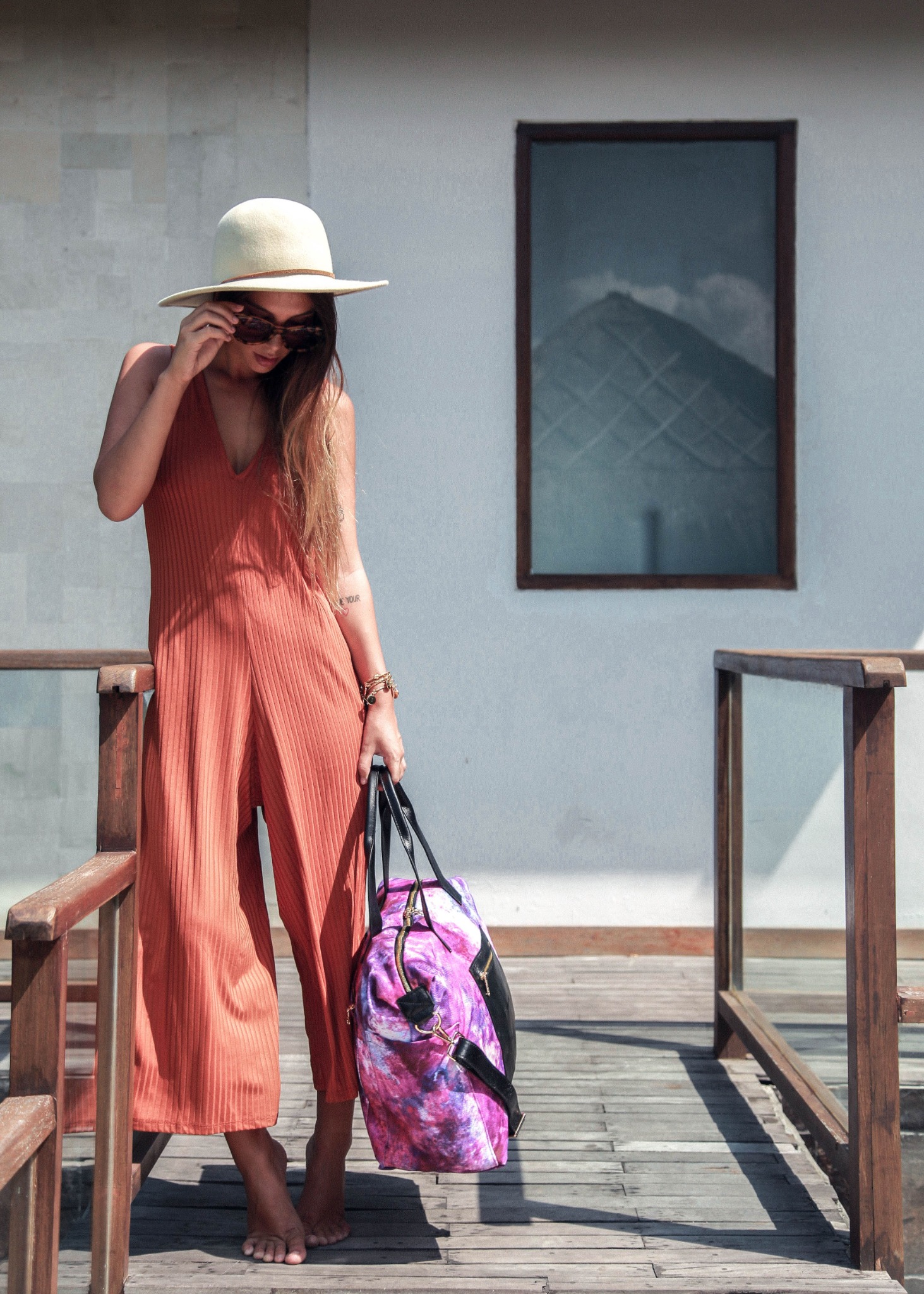 Lifestyle campaign photograph featuring an Obi Kinomi purple duffle bag
