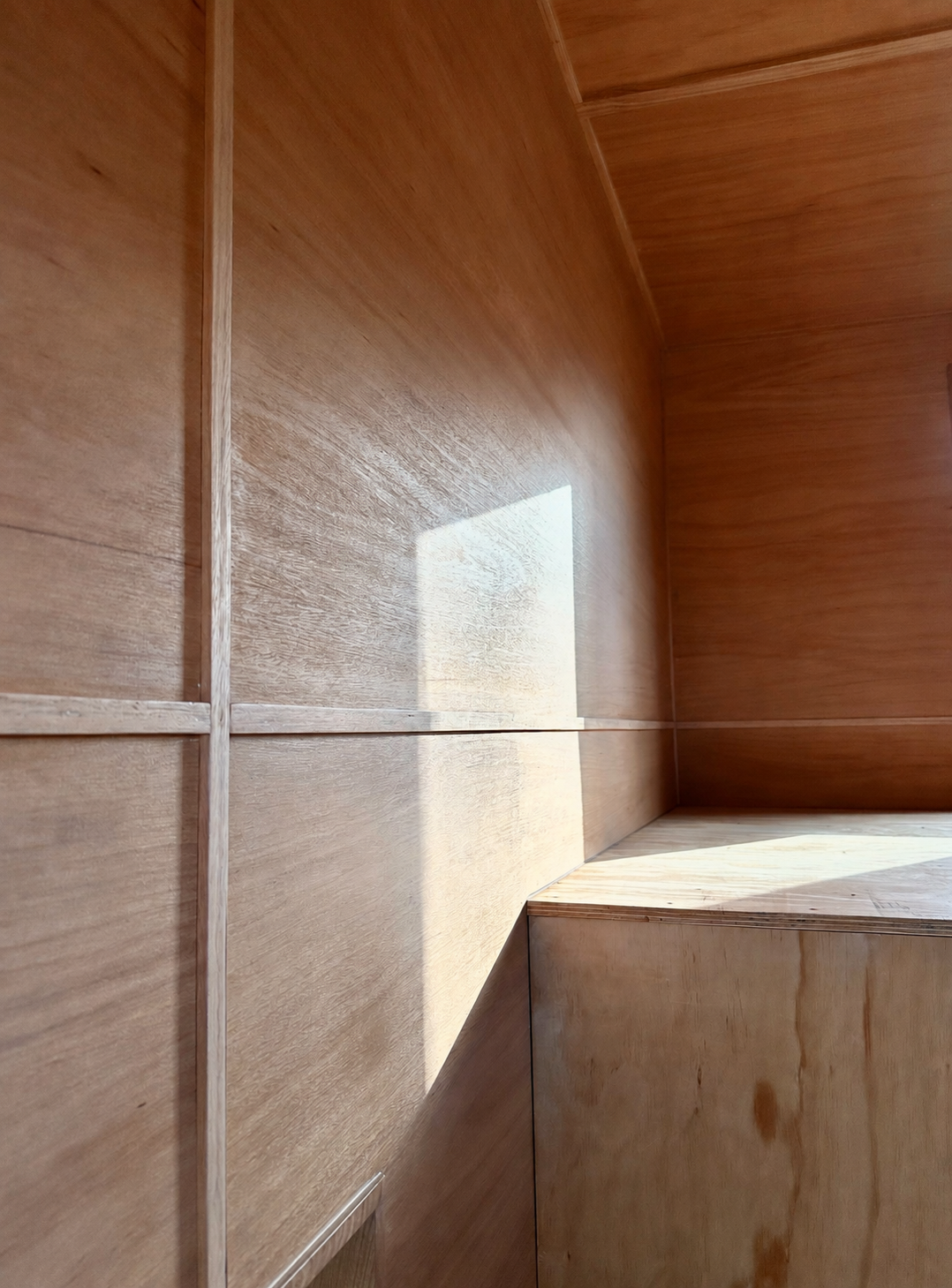 Light cast across the timber interior wall